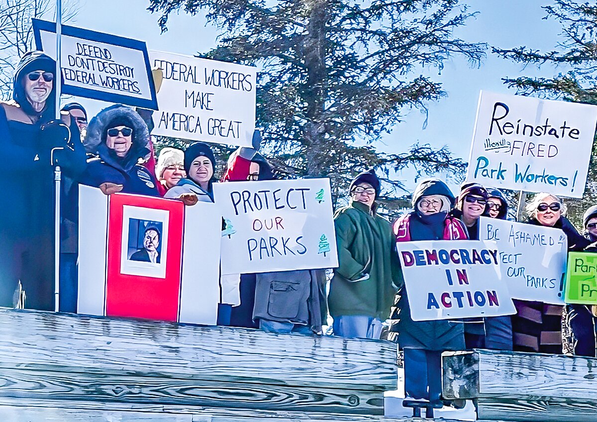 Nearly 50 
protestors turned out at VNP’s Rainy Lake Visitor Center last week to protest major cuts to the National Park Service workforce.