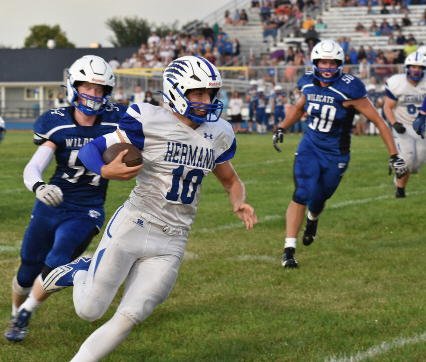 Hermann’s Aiden Eikermann fights for a short gain Friday night against Montgomery County. He finished the game averaging over seven yards per carry on six attempts.