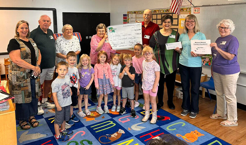 Belle Elementary School’s Stacy Tellman, preschool paraprofessional, was awarded on Aug. 21 a $500 through the Maggie Elder Peers grant, a Missouri Retried Teachers’ association Foundation fund. The Maries-Gasconade Unit of MRTA, including (left) Jean Baker, unit president, Bob Niebruegge, unit secretary-treasurer, along with members of MRTF presented Tellman, second right, with the $500 check.