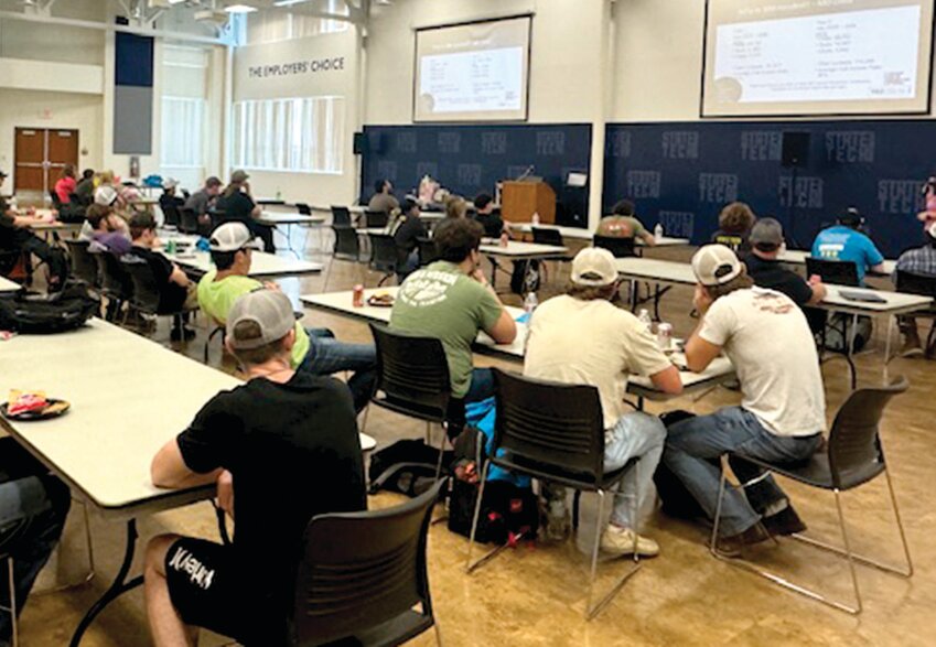 State Tech students listen to a 988 Suicide and Crisis Hotline presentation recently.