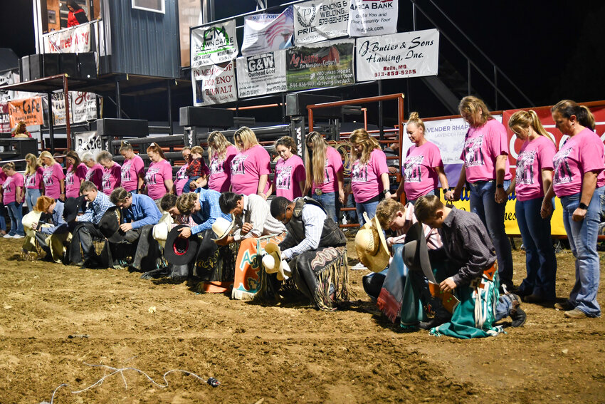 The Ya Ya’s and bull riders of 2023 pray before the beginning of last years Battle of the Bulls.