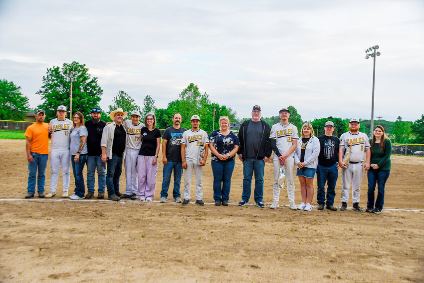 Vienna Eagle baseball seniors (above, from left) Waylon Lenning, Iven Rollins-Pendleton, Zach Via, Alex Zimmer and Jakob Jenkins were recognized by head coach Dakota Mason following Vienna&rsquo;s 13-2 loss to Belle&rsquo;s Tigers Monday night during a Maries County baseball showdown at Vienna City Park. Zach Via (below left, right) rears back to throw out a runner from his shortstop position. Jaiden Hayes (below right, far right) attempts to score but was tagged out by Belle catcher Garrett Gehlert. Vienna faced Dixon last night (Tuesday) to close out their regular season before opening MSHSAA Class 2, District 8 Tournament action tomorrow (Thursday) at Russellville High School against Linn&rsquo;s Wildcats at 6 p.m.