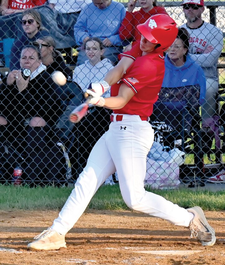 Austin Dudenhoeffer, above, drives in a run with a sac fly in Linn&rsquo;s 4-0 win over St. James on Thursday. Below, Craig Laughlin reaches third on a passed ball and scored on an overthrown ball.