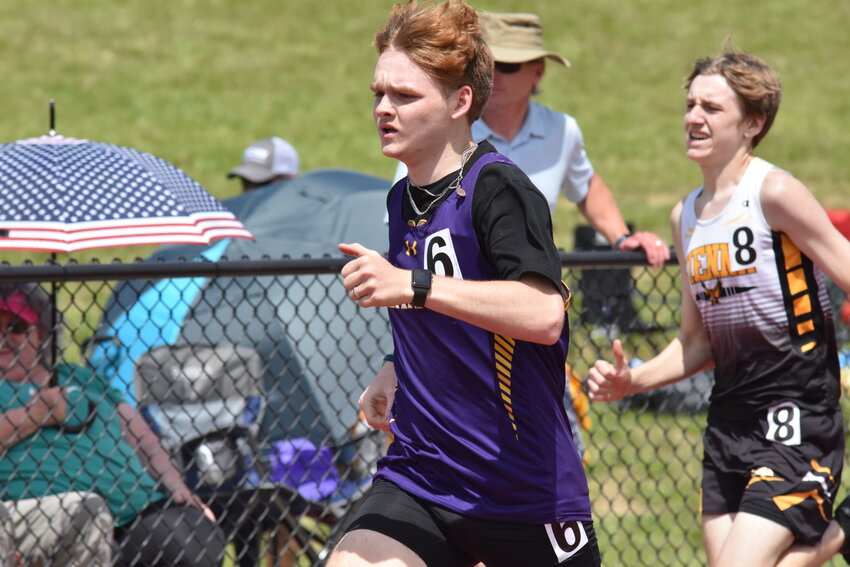 Chamois track: Kaden Wuelling, above, left, Bill Kirsch, left, and Savanah Sieg, battle in their respective events at Saturday&rsquo;s district meet at New Haven.