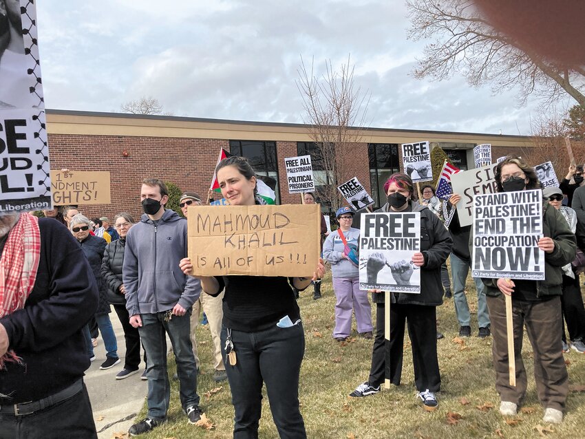 An estimated 200 protesters gathered Sunday afternoon outside ICE offices on Jefferson Boulevard to protest the detention and deportation of people legally in the United States.