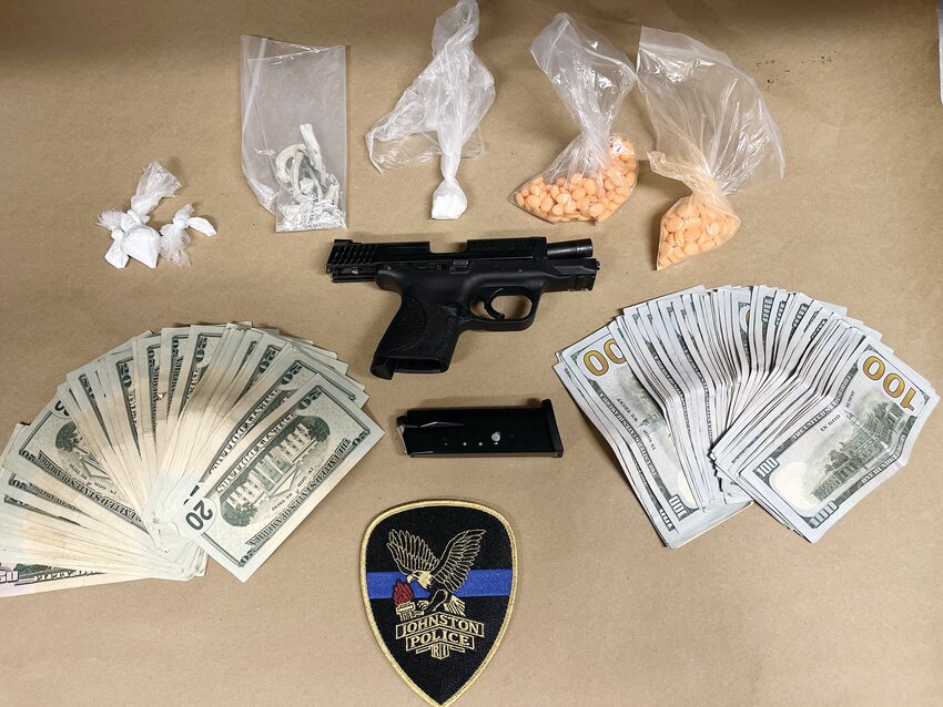 Narcotics, money and a firearm confiscated during a recent search warrant arrest of Anthony Rubino at a residence on Lafayette Street.