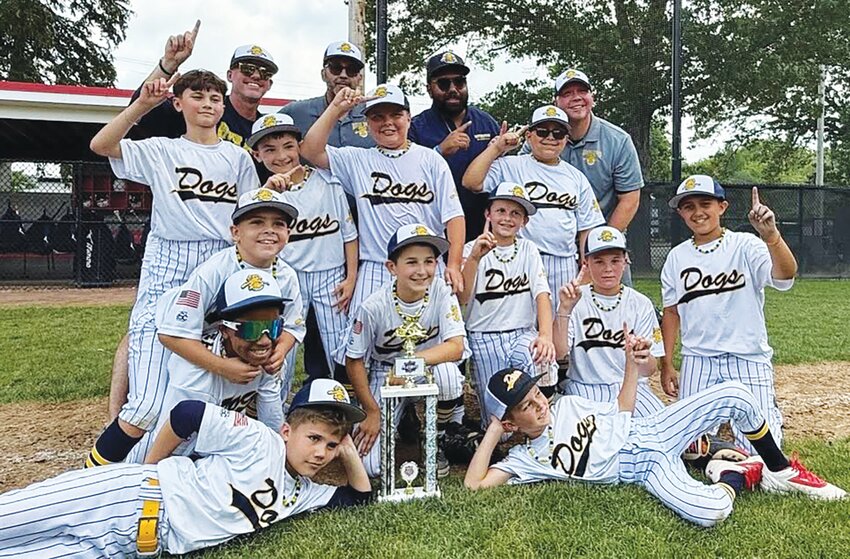 The RiverDogs show off their hardware after winning the league title. Submitted photos