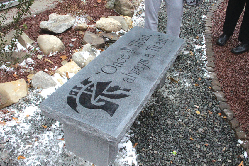 FITTING TRIBUTE: A garden bench memorializes the late Stephen Chrabaszcz.