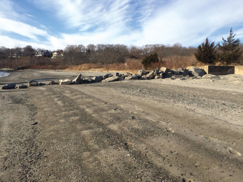 AT THE PARK&rsquo;S EDGE: City crews redistributed rocks and broken concrete that was once part of a wall to define where city and state property at Rocky Point ends. CRMC has instructed the city to remove the rocks, which the city plans to do this week.