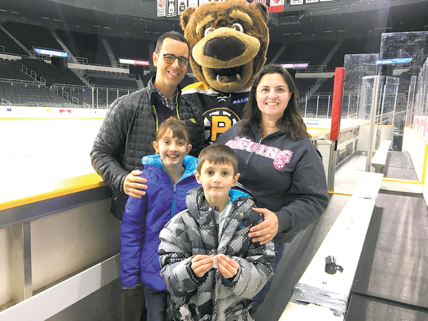 THE &lsquo;FUN&rsquo; IN FUNDRAISING: Rich Pezzillo, executive director of the New England Hemophilia Association and Samboni, the P-Bruins mascot, with Madeline Murray, T.J. Murray and their mother Meagan Murray prior to the game which raises funds for the Tomorrow Fund at Hasbro Hospital.