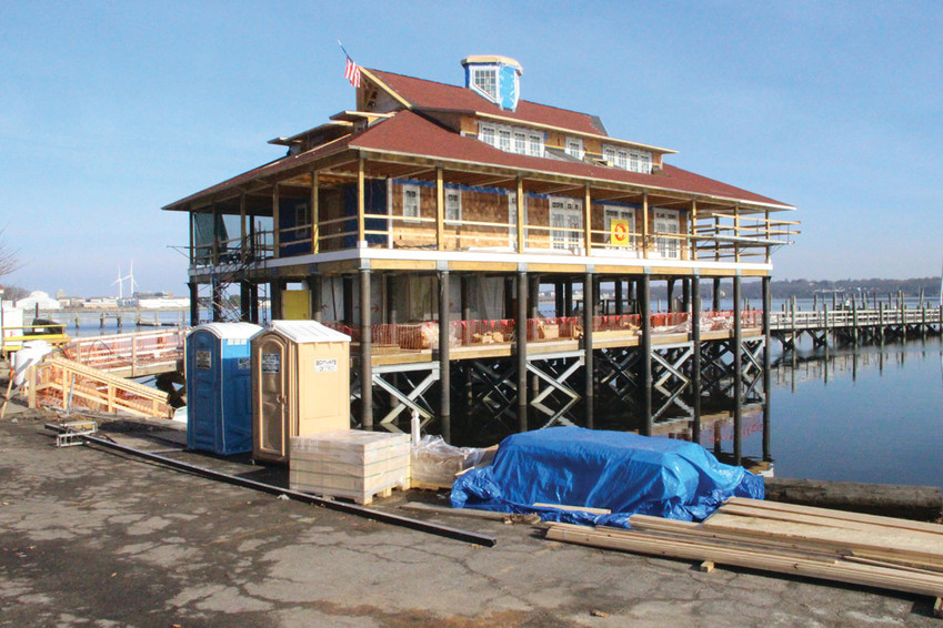 BACK AGAIN, ONLY BETTER: The Edgewood Yacht Club, built on the site of the club that burned in a 2011 winter storm, is nearing completion.