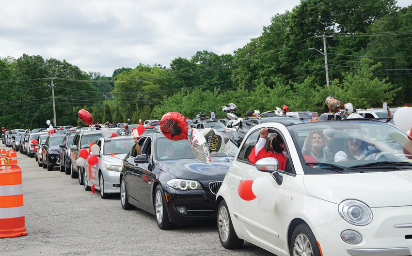 Cars line up for the Cranston West Senior Motorcade.