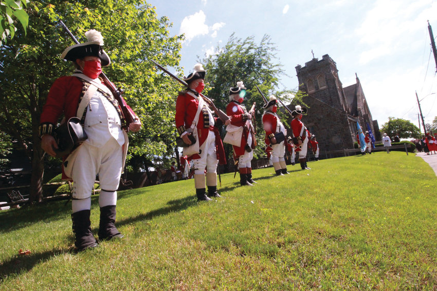 APPROPRIATELY SPACED: The Pawtuxet Rangers played a selection of songs followed by the firing of muskets in an abbreviated and somewhat private &ndash; so as not to draw a crowd &ndash; observance of Gaspee Days.