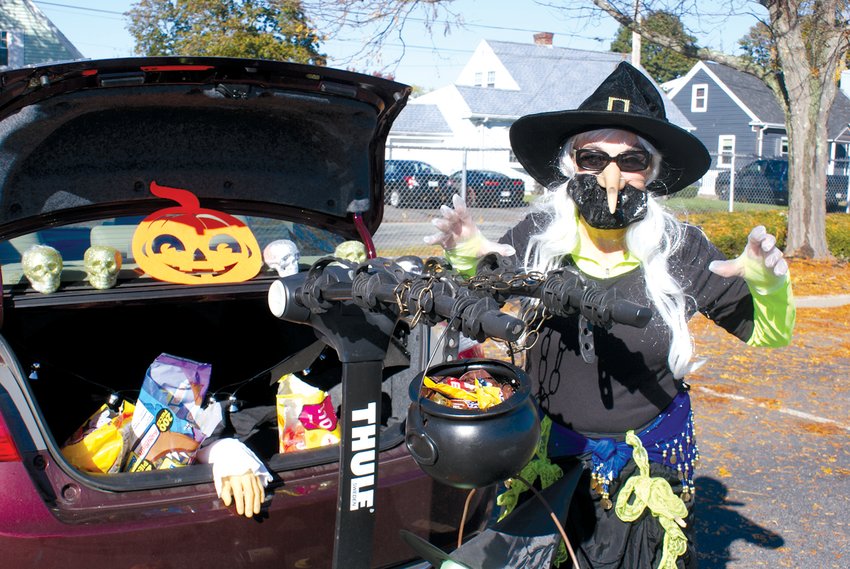 TRUNK OR TREAT: Dee Soares, who works for the city of Cranston in the IT Department, welcomed each car that drove through the Trunk or Treat event held at Cranston Stadium.&nbsp;