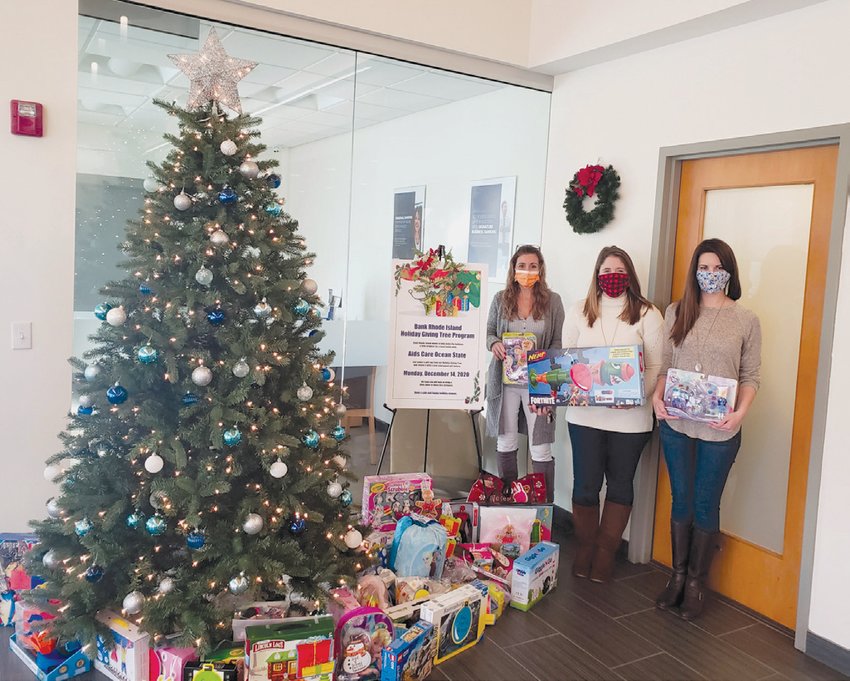 SEASON OF GIVING: Across BankRI&rsquo;s three Cranston branches, nearly 200 gifts were collected for children served by Aids Care Ocean State, Comprehensive Community Action Program, and SSTARbirth. Statewide, the 23rd annual effort led to 2,659 gifts for kids in need. Pictured, from left, are Jenn Parrillo, Park Avenue assistant branch manager; Amanda Guarini, teller supervisor; and Lydia Himmighoefer, teller. (