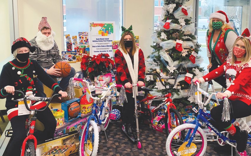 GIVING BRANCH: Bikes, Lego sets, sports equipment and dolls were just some of the more than 200 gifts collected by BankRI&rsquo;s Jefferson Boulevard branch during this year&rsquo;s Holiday Giving Tree. Together, the bank&rsquo;s three Warwick branches provided 554 gifts to children served by the Boys &amp; Girls Clubs of Warwick. Statewide, the 23rd annual effort led to 2,659 gifts for kids in need. Pictured here are: Nancy Lapre, Jefferson Boulevard Branch Manager; Ben Korn, Teller; Renee Labossiere, Teller Supervisor; Lori Lepizzera, Assistant Branch Manager; and Destiny Gill, Universal Banker.