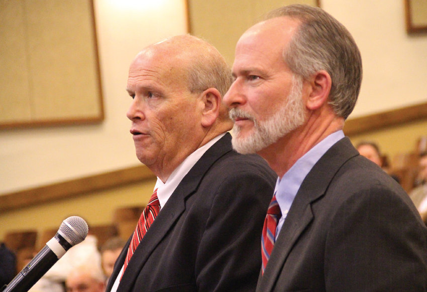 PROCEDURAL DELAY: Attorneys Robert Murray, left, representing the Natick Avenue solar project&rsquo;s applicant, and Patrick Dougherty, representing abutters of the site, address the Planning Commission at Cranston High School East in this January 2019 photo.