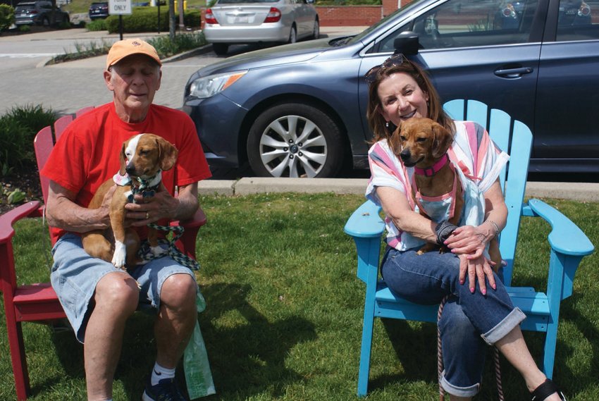 TOGETHERNESS: Ron and Dianne Renzi attended the Yappy Hour this past weekend in Garden City Center. With them are their 2-year-old Dachshunds, Frankie and Rosie Marie. They were there to enjoy a nice afternoon and support the EGAPL Heart of RI Animal Rescue League.