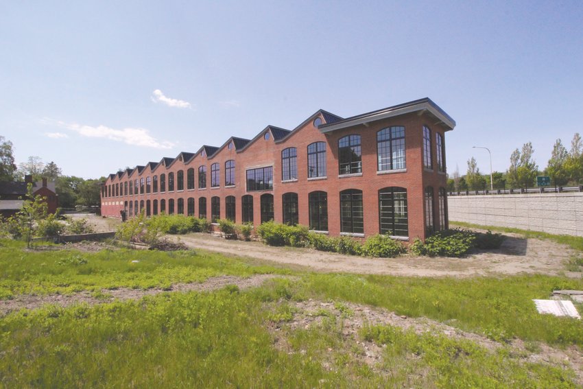 FUTURE CITY HALL ANNEX: The city will be leasing the renovated Sawtooth Building, the only remaining building of the Apponaug Mill, from AAA Northeast for municipal offices. AAA will build out the offices according to city specifications under the agreement.