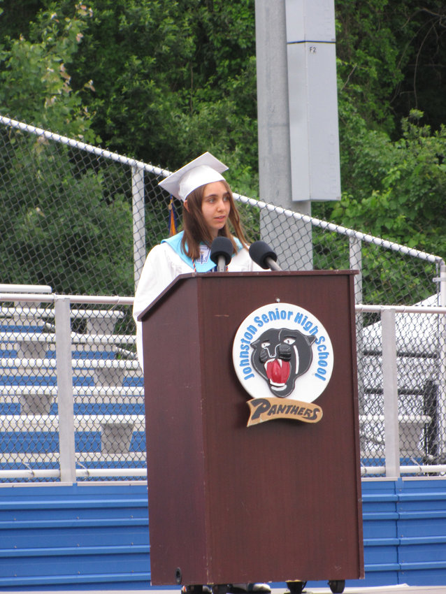 Salutatorian of the Johnston High School Class of 2021, Audry Mahony, address the crowd at the commencement ceremony.