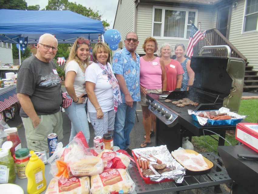 NEIGHBORHOOD NICHE: The Amalfitano family (Megan, Diana and Steven &ndash; are  joined by Joe Toppi, Linda Toppi, Sherry Toppi and their friend Sue during Sunday&rsquo;s starspangled  Hazard Happening in the Oakland Beach section of Warwick. (Warwick Beacon  photos by Pete Fontaine)