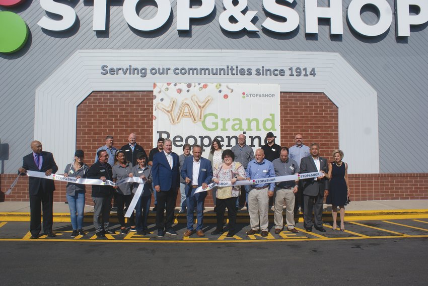 CELEBRATION: Last week, Stop &amp; Shop located on Atwood Ave., was joined with Mayor Ken Hopkins as they unveiled their newly renovated store. Pictured at the Ribbon Cutting along with the Mayor is Rick Fraielli, Store Manager and employees.