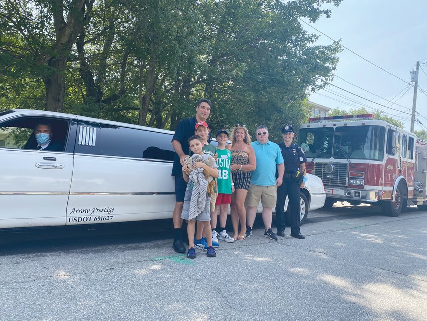 WAY TO GO, COLE: Cole got to ride in style to and from his last cancer treatment on Thursday. From left, David Neri with sons Lorenzo and Luciano, Cole Robinson with his parents Dawn and Sean, and Rebekah Neri.