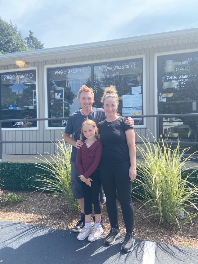 THE CASE CAF&Eacute;: Jay and Jessica Case stand outside their new caf&eacute; in Warwick Neck along with their daughter Juliet