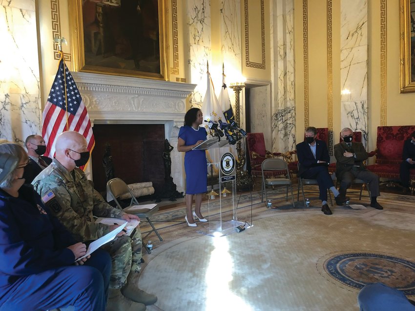 HOLIDAY CHEER: Lt. Gov. Sabina Matos speaks during last week&rsquo;s announcement at the State House.