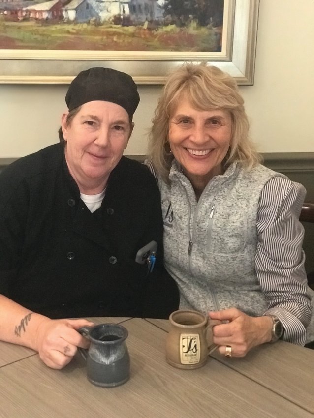 A FINAL CUP OF COFFEE: Recently retired after 35 years at T&rsquo;s Restaurant, Donna Sweeney has a cup of coffee with Tina Tomaselli, co-founder and co-owner of T&rsquo;s Restaurant.