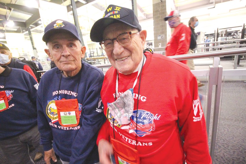 BINGO GUYS: Vietnam War vet Billy Hancock, left, served as guardian of WWII vet Peter Ricci. The two  first met at Foxwoods and on Saturday they traveled together to Washington. (Herald photos)