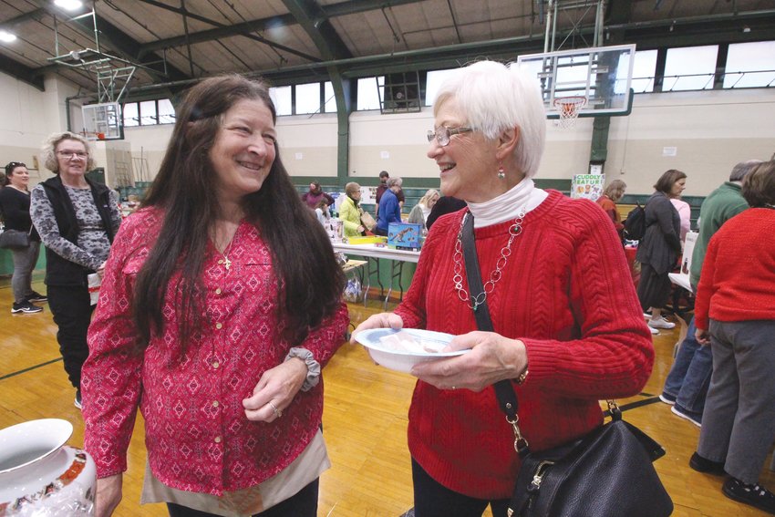 IT TAKES MANY: Loriann Bose, who coordinated the bazaar, at left, with Helene Soucy, one of Bose&rsquo;s dedicated team.