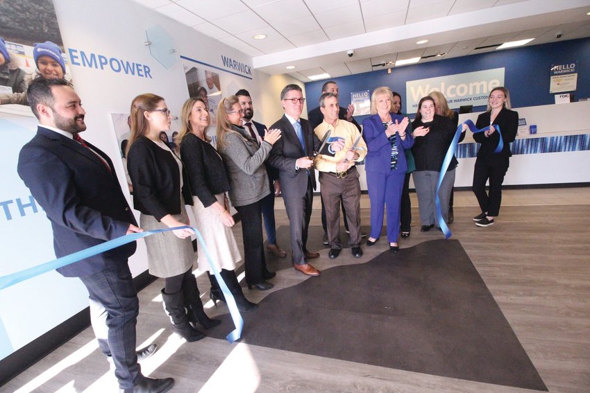 FIRST IN WARWICK: With a ribbon cutting Tuesday morning, BankNewport opened its 18th branch and first in Warwick at Wildes Corner. Pictured from left are: Scott Schellenberg, Sarah Peasley and Amy Riccitelli of BankNewport, Lauren Slocum, President &amp; CEO, Central Rhode Island Chamber of Commerce, Diogo Ventura, Vice President/Premier Relationship Banker, Jack Murphy, BankNewport President &amp; CEO, Mayor of Warwick, Frank J. Picozzi and Steven Carneiro, Mary Leach, Jessica Couto, Melinda Vieira, all of BankNewport, Kimberly Raymond, OceanPoint Insurance, and Haley Perogino, BankNewport.