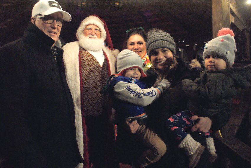 READY FOR CHRISTMAS:&nbsp; Mayor Ken Hopkins and Santa Claus greeted Maria Manzi (Chair of the event), her daughter Brittney Richards with her two children, Emma, age 1 and J.J, age 3.