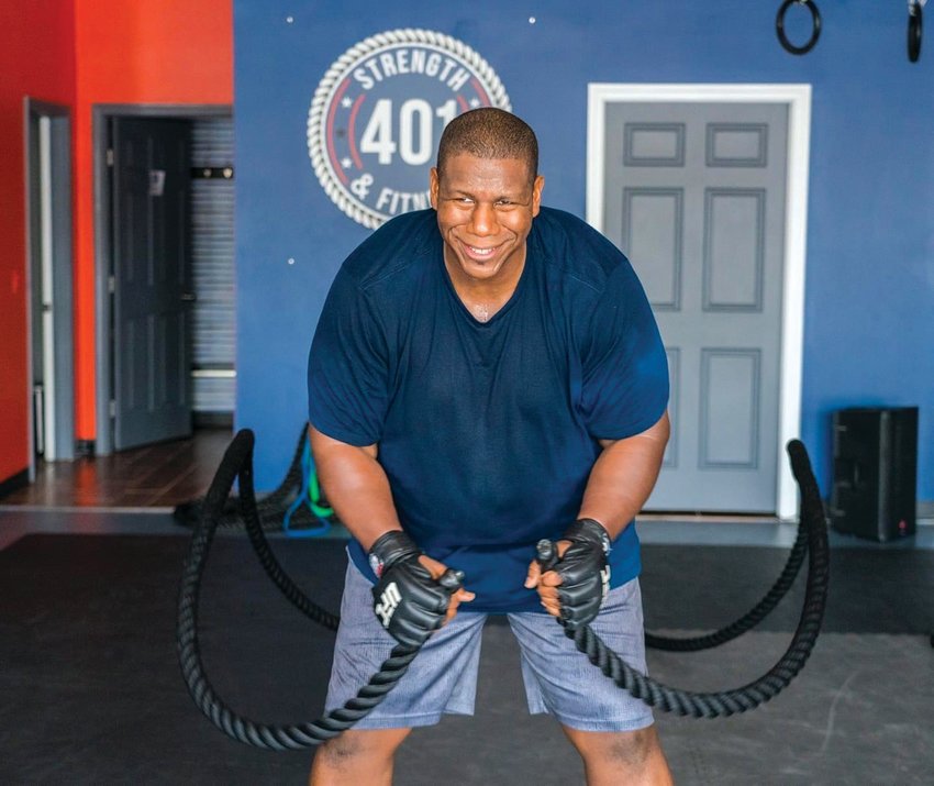 GIVING BACK: Pilgrim  High School  graduate Emerson  Kilgore opened 401  Strength &amp; Fitness  in the fall of 2020  as a way to help  athletes and adults  meet their fitness  goals. The gym is located at 400 Warwick Ave.