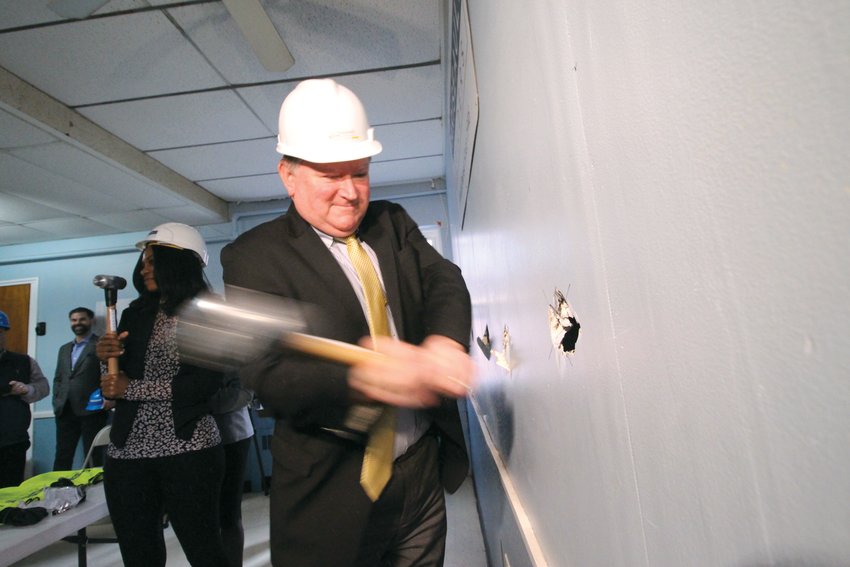 WALLBREAKING: Senate Majority Leader Michael McCaffrey was one of those in attendance for the wall breaking ceremony on Wednesday afternoon at the Beach Avenue Apartments. The apartments will help to bring more affordable housing in Warwick. The building was once the Rhode Island Family Shelter and before that was part of St. Benedict Church.&nbsp;(Warwick Beacon photos)