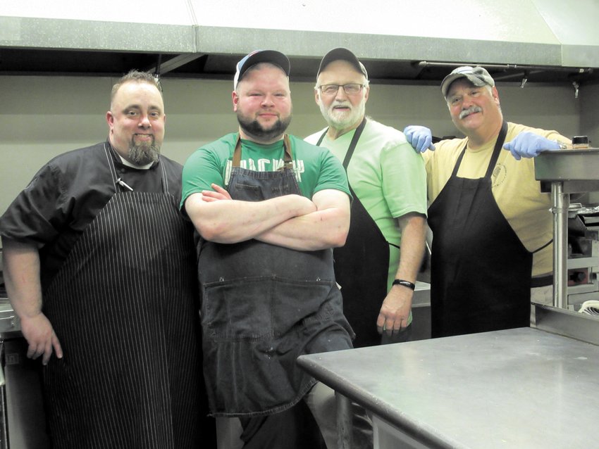 CHEF&rsquo;S CORNER: Rob DeRemr, Brian Ashness, Bob Hartington and Eric Lopes prepared and cooked what people called &ldquo;the best St. Patrick&rsquo;s Dinner we&rsquo;ve ever had&rdquo; (here at the Tri-City Elks Lodge last Saturday night.&rdquo;                                         Warwick Beacon photos by Pete Fontaine