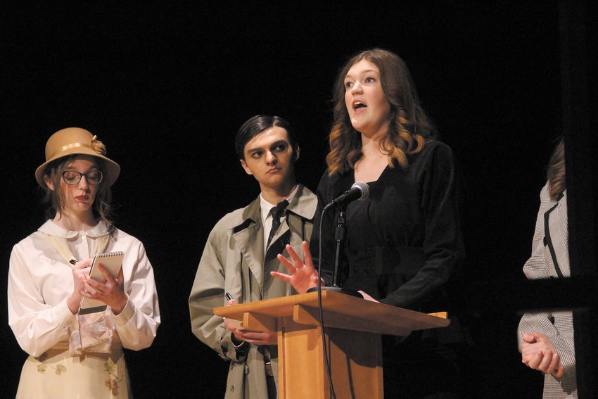 QUIZZING: Reporters played by Sarah Whelan, David Rowley  question  Dr. Marie Curie, played by Sarah Whelan as she talks about the benefits of radium