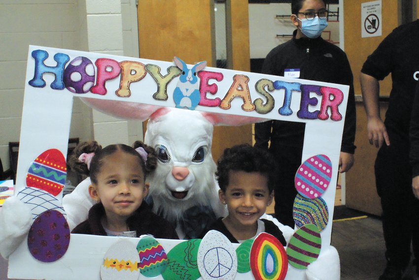 MEET THE EASTER BUNNY: Siblings Vida German, 5, and Israel German, 5, enjoyed meeting the Easter Bunny and stooped by the bunny.