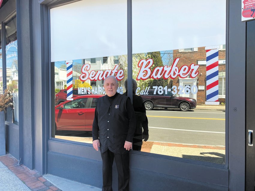 CUTTING HAIR SINCE THE 60s: Henry Cipriano Jr. of Senate Barber on Rolfe Square has been in business for 62 years.