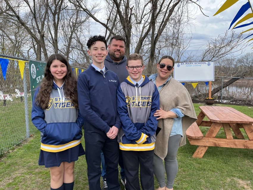 OUTDOOR CLASSROOM: On April 23, Aidan Paplauskas and volunteers assisted him in his Eagle project which consisted of creating an outdoor classroom for St. Mary&rsquo;s School. Pictured from left are: Sophia Paplauskas (Aidan&rsquo;s sister), Aidan Paplauskas, Chris Paplauskas (Aidan&rsquo;s dad), Ryan Chase and Judy Paplauskas (Aidan&rsquo;s mom). (Submitted photo)