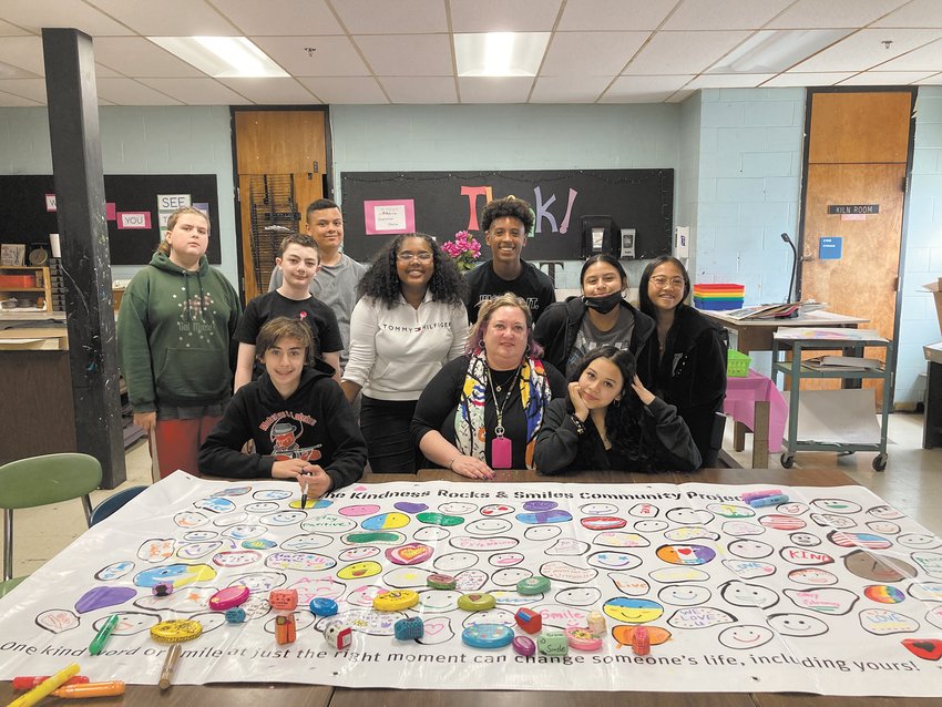 SENDING SUPPORT THROUGH ART: Seventh and eighth grade students in Mary Greim-Gallo&rsquo;s Western Hills Middle School art class created drawings, kindness rocks and completed a banner to send to a refugee center in Przemysl, Poland, to show their support for Ukrainains. (Herald photo)