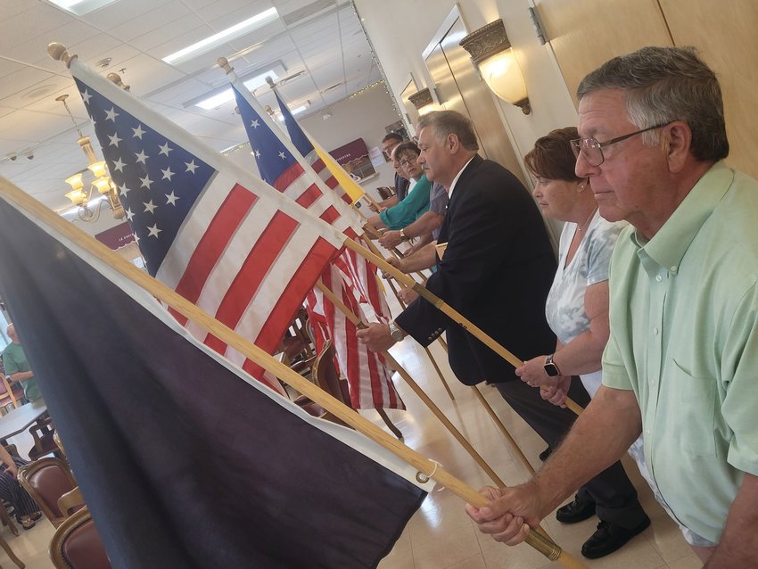 BANNERS UNITED: Members of Warwick&rsquo;s Tri-City Elks Lodge held flags from throughout the American experience. From the original &ldquo;Stars &amp; Stripes&rdquo; to an &ldquo;MIA/POW&rdquo; flag, patriotism was on full display during the Flag Day ceremony held at the Johnston Senior Center.  (Sun Rise photos by Rory Schuler)