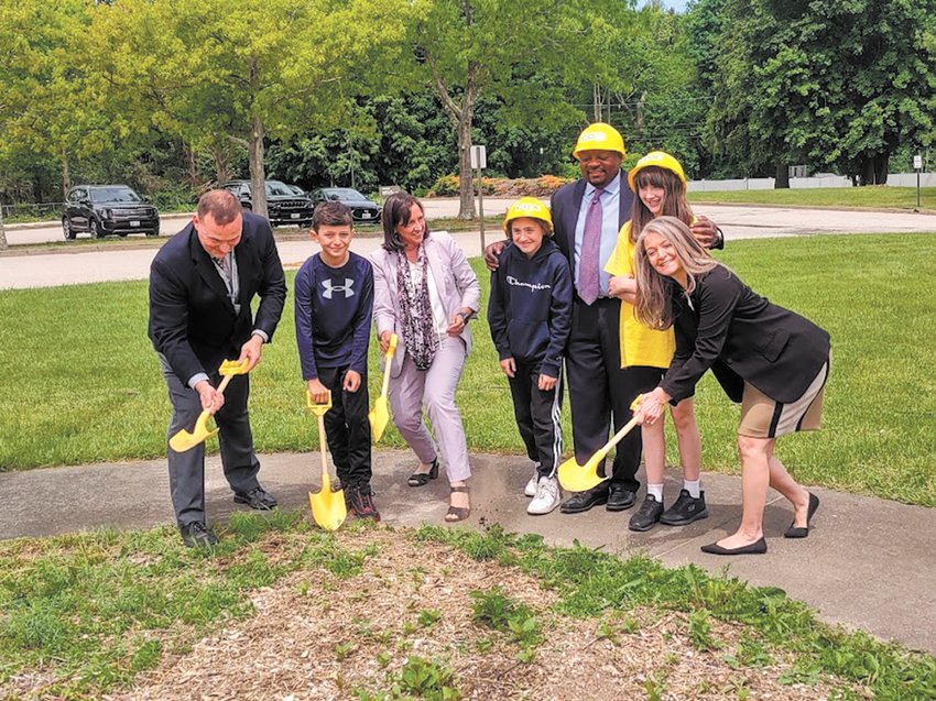 GROUNDBREAKING EXCITEMENT: students and staff at Hope Highlands Middle School joined Deputy Commissioner Odom-Villella and Cox Communications Vice President of Business, Eddie Jenkins in breaking ground for the new community garden at the school. (Photo courtesy of Cranston Public Schools)