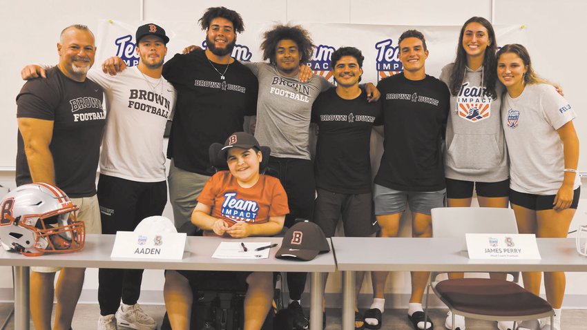 HE&rsquo;S A BEAR: 13-year-old Aaden Bessette of Warwick signs on with the Brown Football team through Team Impact. (Submitted photo)