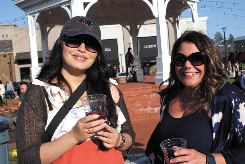 HERE FOR FUN: Wendy Zhu (left) and Jen Colasante were two participants at this past weekend&rsquo;s Beer Garden. Both graduated from Cranston East.