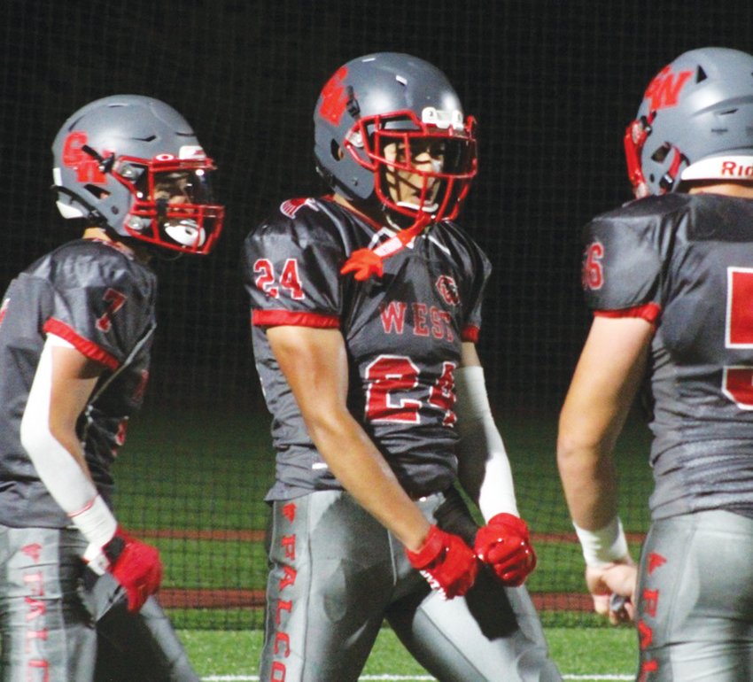 STATEMENT WIN: West&rsquo;s Adrian Samayoa (24) celebrates after scoring a touchdown. (Photos by Alex Sponseller)