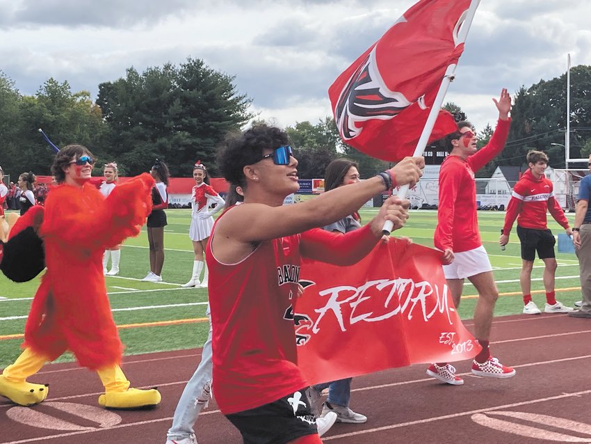 HYPE TIME: Following the Pledge of Allegiance and the singing of the National Anthem, Cranston West&rsquo;s Red Storm hyped up the student body before introducing the school&rsquo;s sports teams.