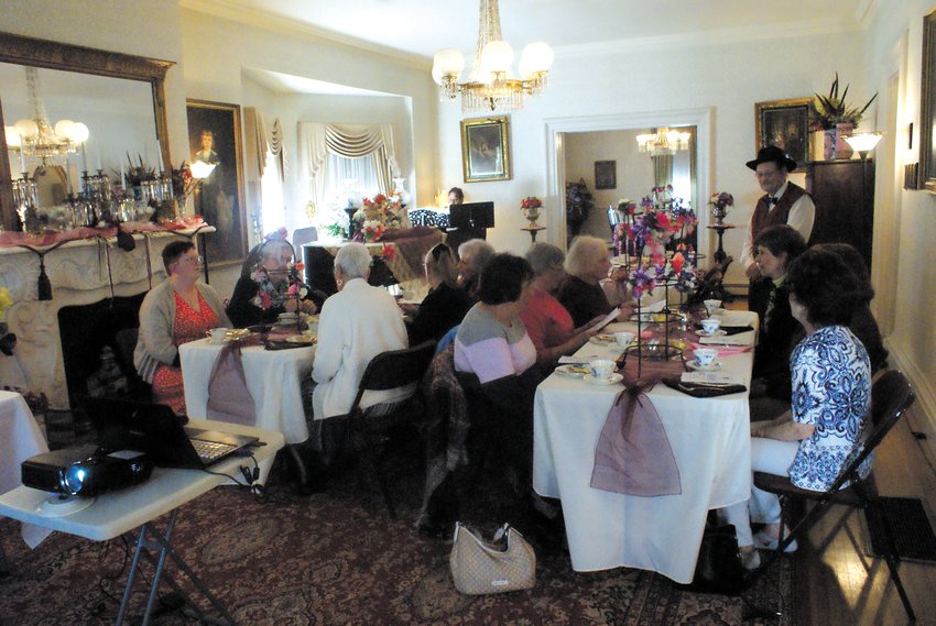 GATHERING TOGETHER: Guests sipped on tea and ate goodies while listening to Maria Vazquez&rsquo;s presentation.