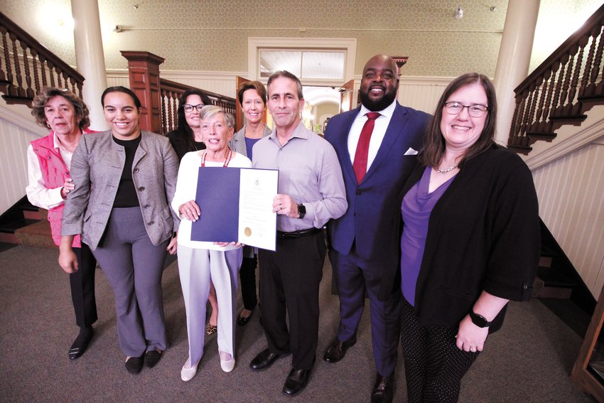 RIGHTS RECOGNIZED: Mayor Frank Picozzi recently issued a proclamation in recognition of October as National Long-Term Care Residents&rsquo; Rights Month. Joining the mayor for the declaration at City Hall are from left front row: Joann Leonard, Chief Operations Officer of the Alliance for Better Long Term Care; Nicole Arias, Equity and Engagement Director of the Office of Healthy Aging (DEA); Kathleen Heren, RI State long Term Care Ombudsman; Everett Handford, Regional Director of the US Department of Health and Human Services and Jennifer Throwe Regional Administrator of the New England, Center for Regional Operations. Administration for Community Living of the U.S. Department of Health and Human Services. In the back row are Lori Light, Ombudsman Training Coordinator and Ginny Lee, Volunteer Ombudsman. (Warwick Beacon photo)